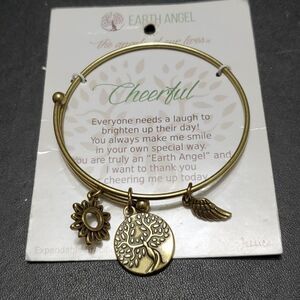 Earth Angel gold tone cheerful bracelet